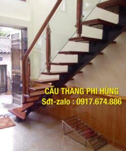 Cầu thang xương cá lan can kính , lan can inox