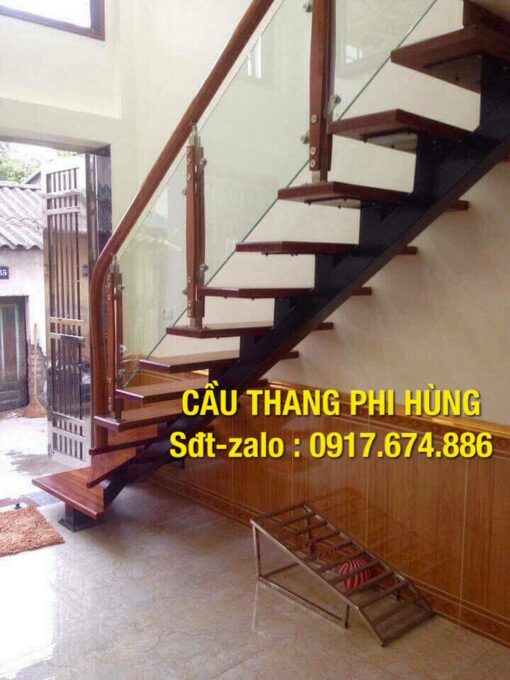 Cầu thang xương cá lan can kính , lan can inox