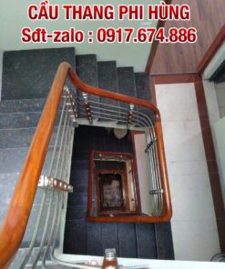 Cầu thang lan can inox tay vịn gỗ ở Hà Nội, báo giá cầu thang inox tay vịn gỗ