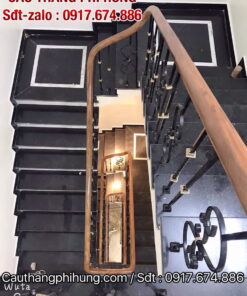 Cầu thang sắt nghệ thuật, lan can cầu thang sắt tay vịn gỗ