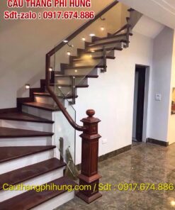 Xem ngay các mẫu cầu thang lan can kính cường lực hiện đại, Báo giá cầu thang kính đẹp tay vịn gỗ ở Hà Nội