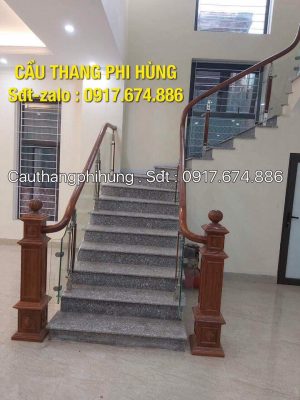 Báo giá cầu thang lan can kính cường lực tay vịn gỗ tại Bắc Ninh. Thi công cầu thang kính chuyên nghiệp tại Bắc Ninh