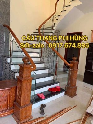 Báo giá cầu thang kính tay vịn gỗ, Lan can cầu thang kính cường lực đẹp tại Quảng Ninh