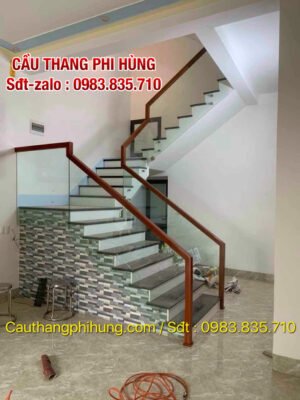 LAN CAN CẦU THANG KÍNH TAY VỊN GỖ